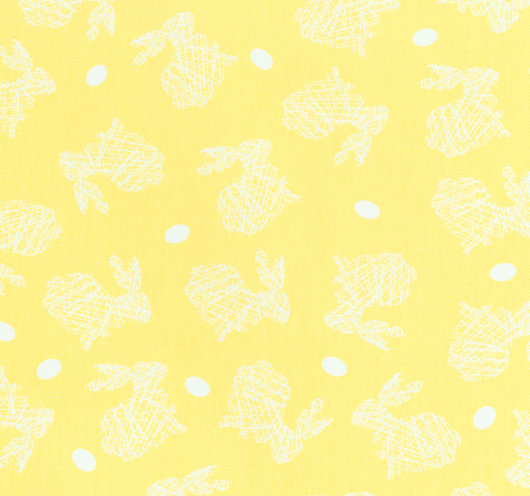 Žuti tekstil s motivima za Uskrs.