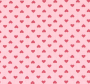 Dekorativna ružičasta tkanina s motivima srca.