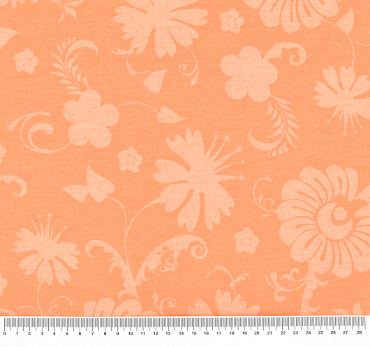 Narančasta tkanina sa stiliziranim cvjetovima.