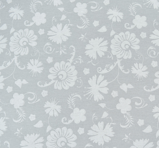 Siva tkanina sa stiliziranim cvjetovima.